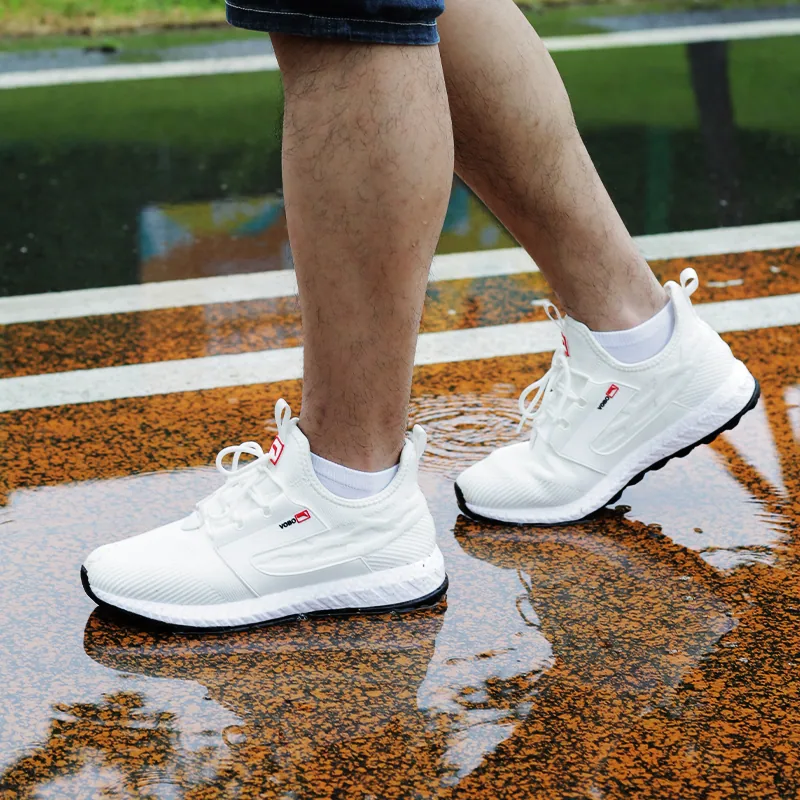 Deepwater Phantom white shoes outdoors on wet pavement
