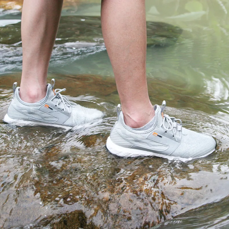 White Deepwater Phantom shoes being worn in wet conditions